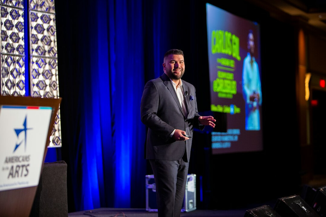 confident executive on stage