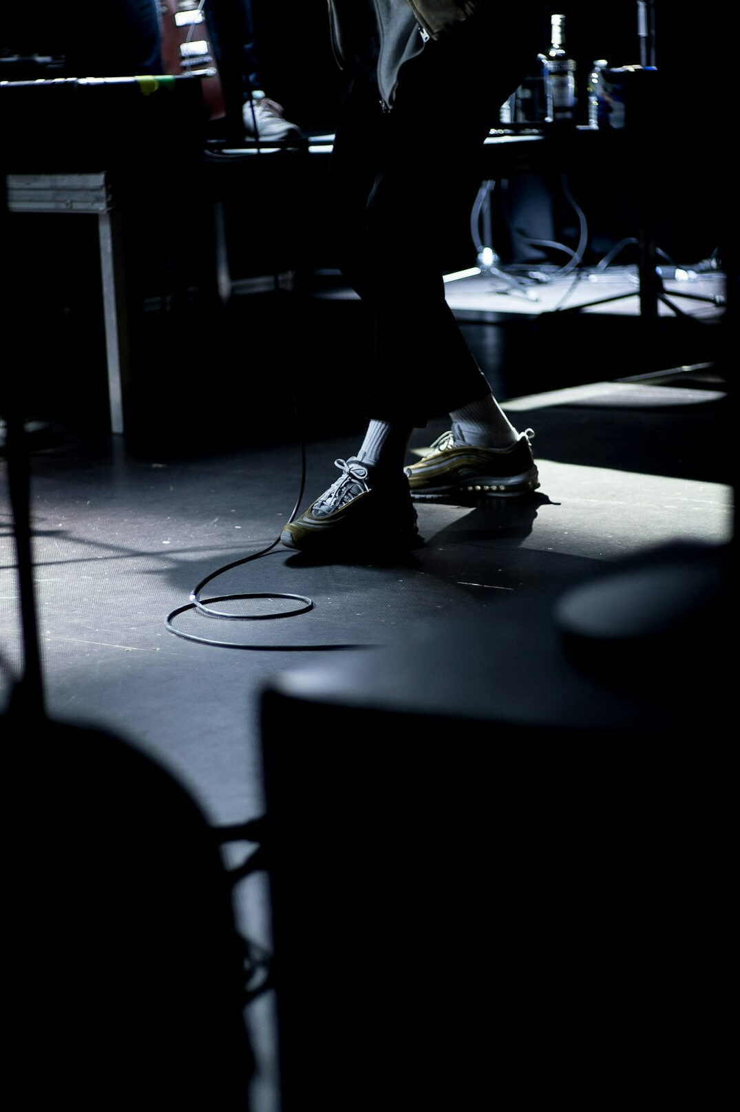 speaker controlling voice on stage
